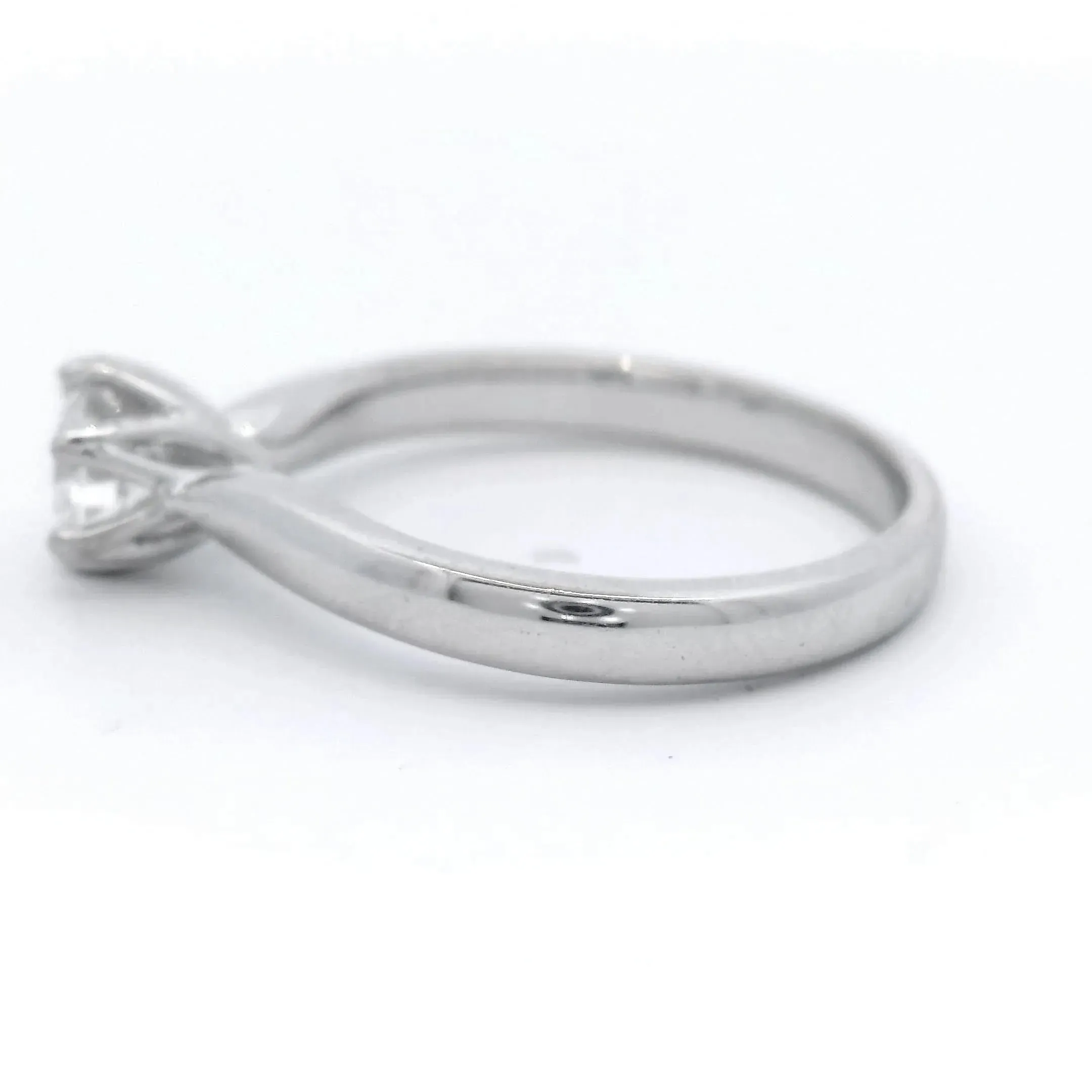 0.60 Carat Mined Round Brilliant Cut Solitaire Diamond Ring