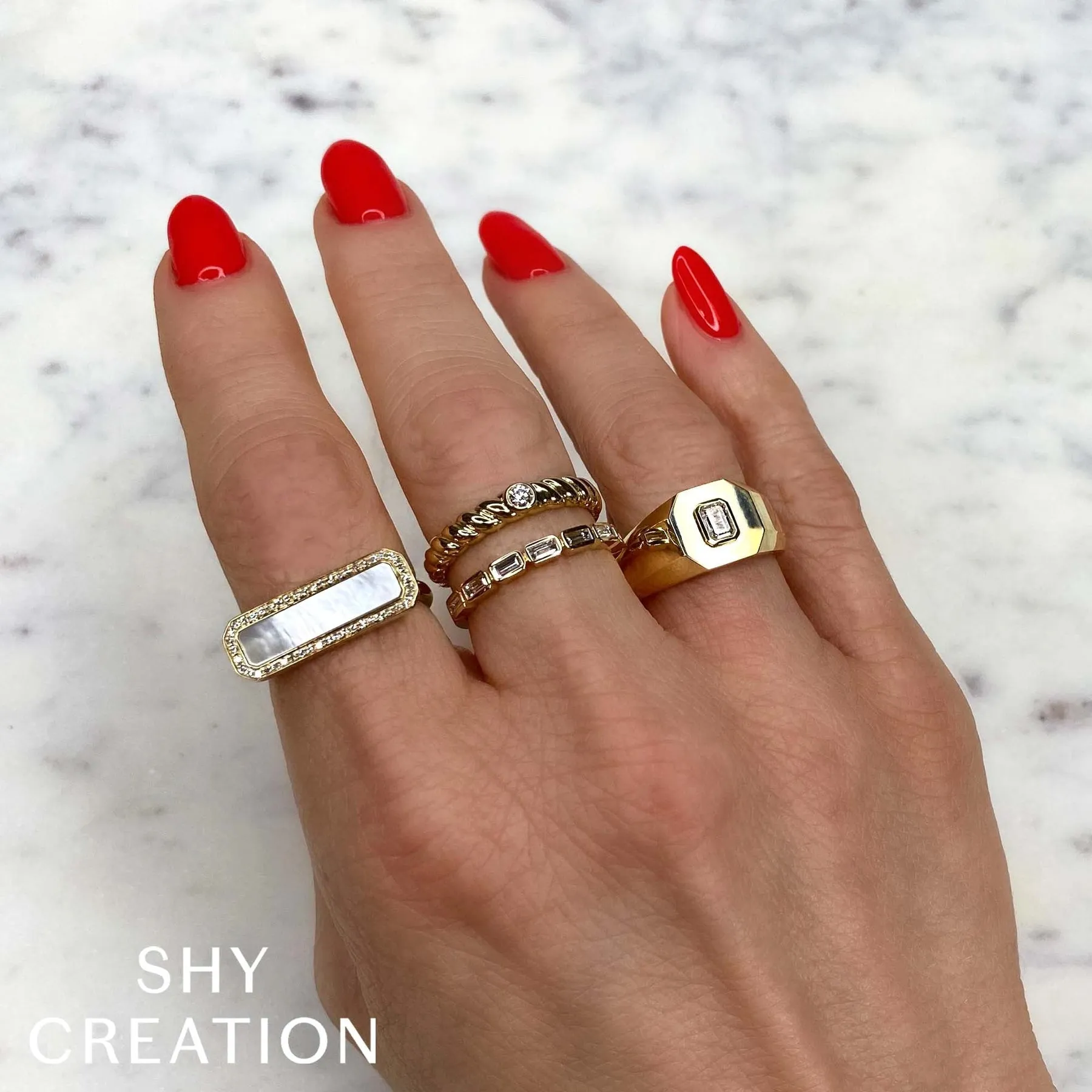 14K Gold 0.07 Carat Diamond Bezel Twist Ring