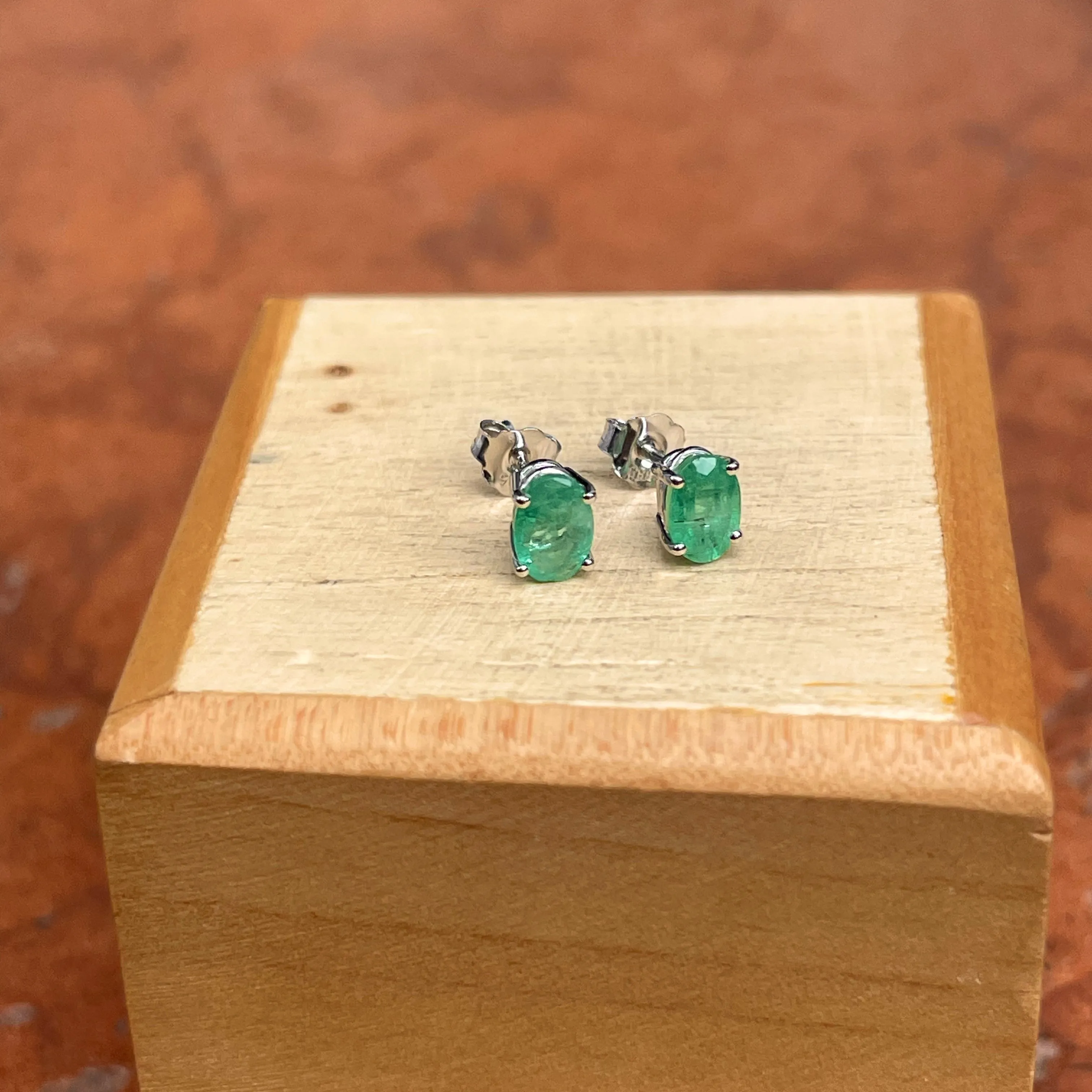 14KT White Gold Oval 1.00 CT Colombian Emerald Stud Earrings