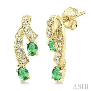 4x3 MM Oval Cut Emerald and 1/5 ctw Round Cut Diamond Precious Earrings in 14K Yellow Gold