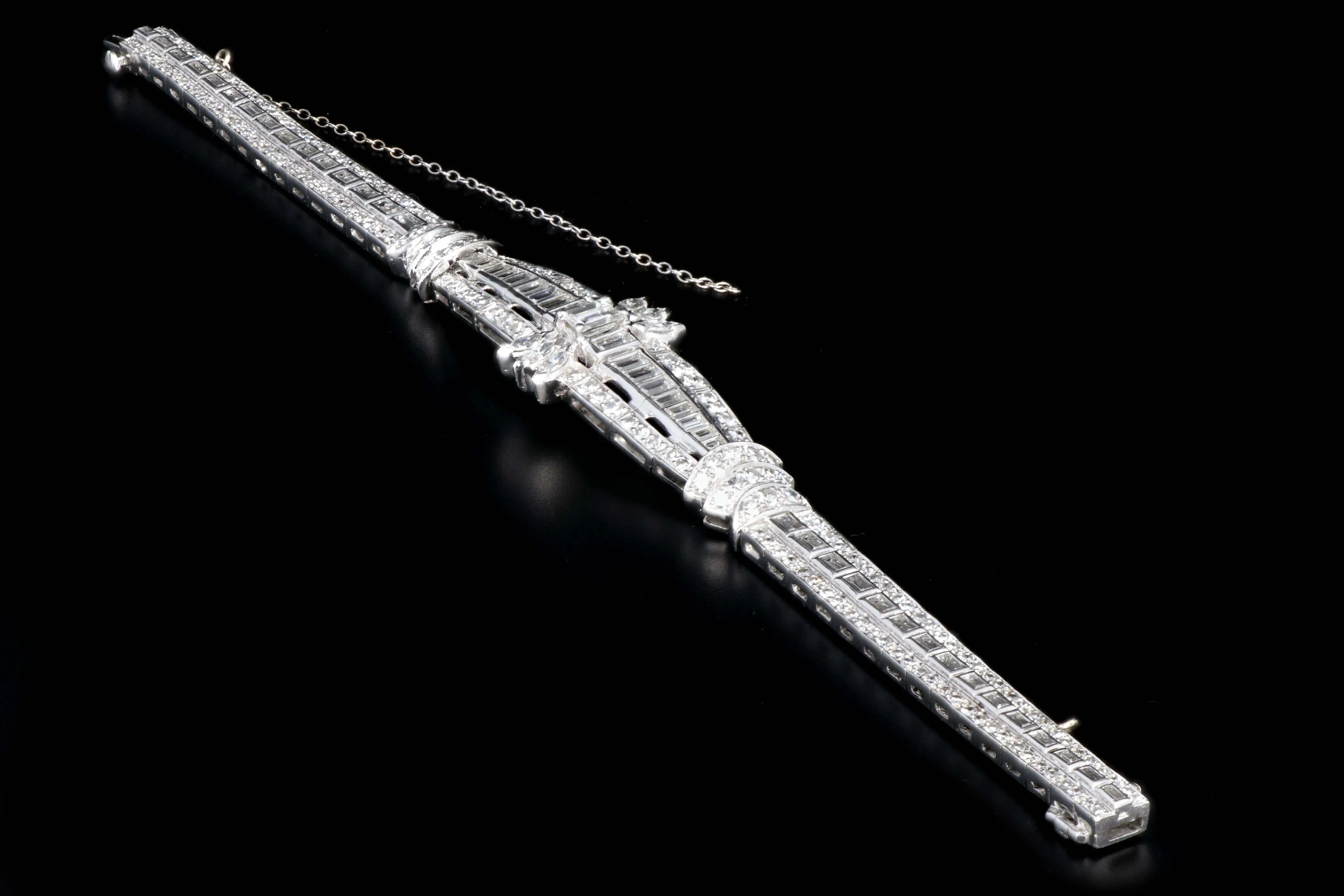 Art Deco Platinum 6 Carat Emerald, Marquise, Straight Baguette, and Single Cut Diamond Bracelet