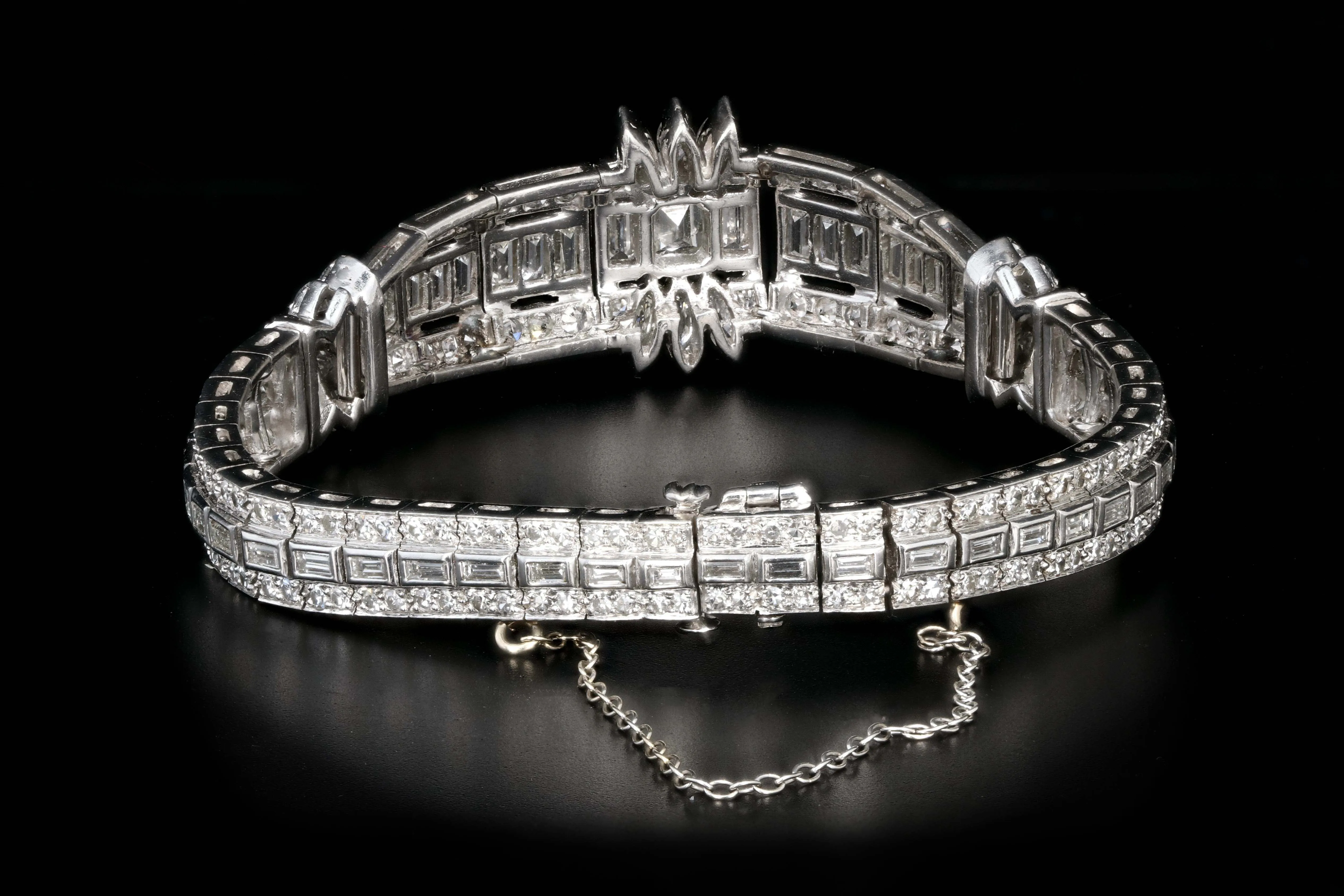 Art Deco Platinum 6 Carat Emerald, Marquise, Straight Baguette, and Single Cut Diamond Bracelet