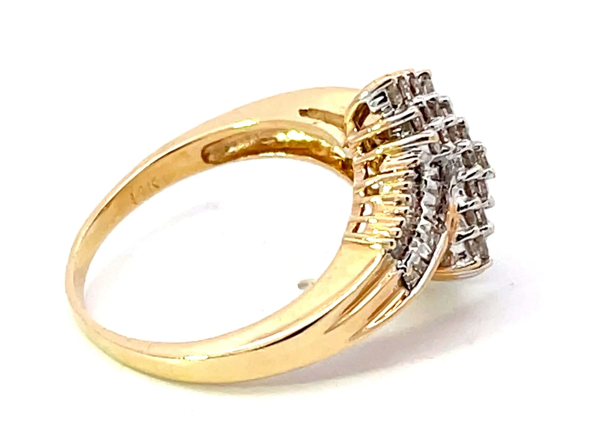 Baguette and Brilliant Cut Diamond Twist Ring in 14K Yellow Gold