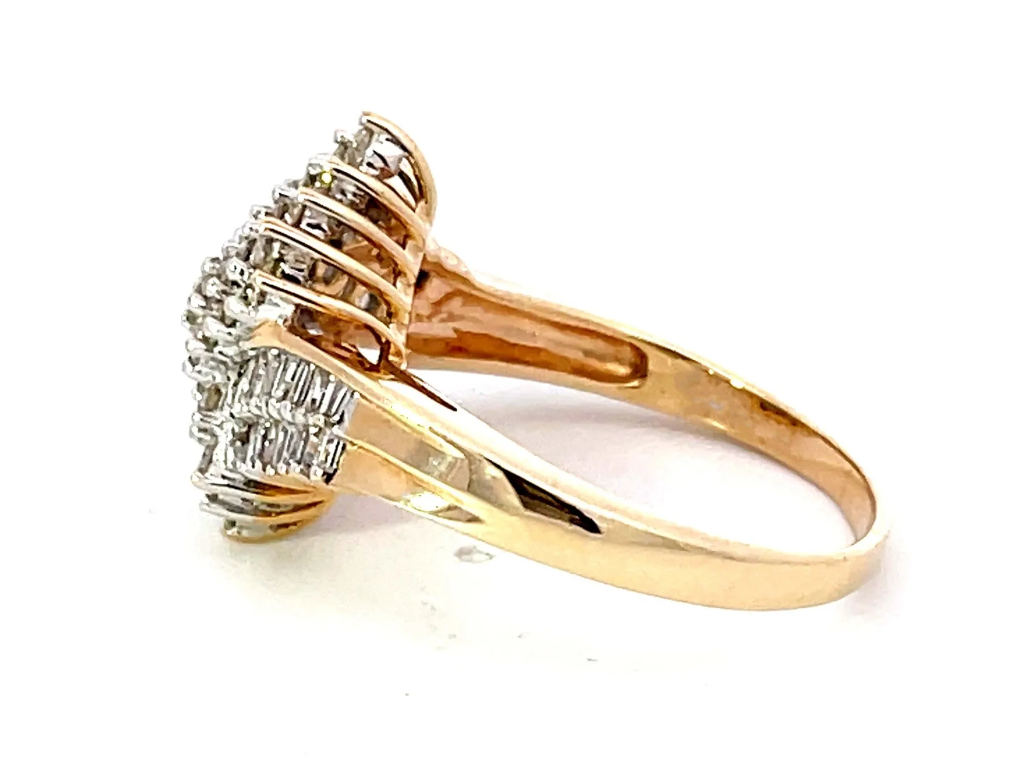 Baguette and Brilliant Cut Diamond Twist Ring in 14K Yellow Gold