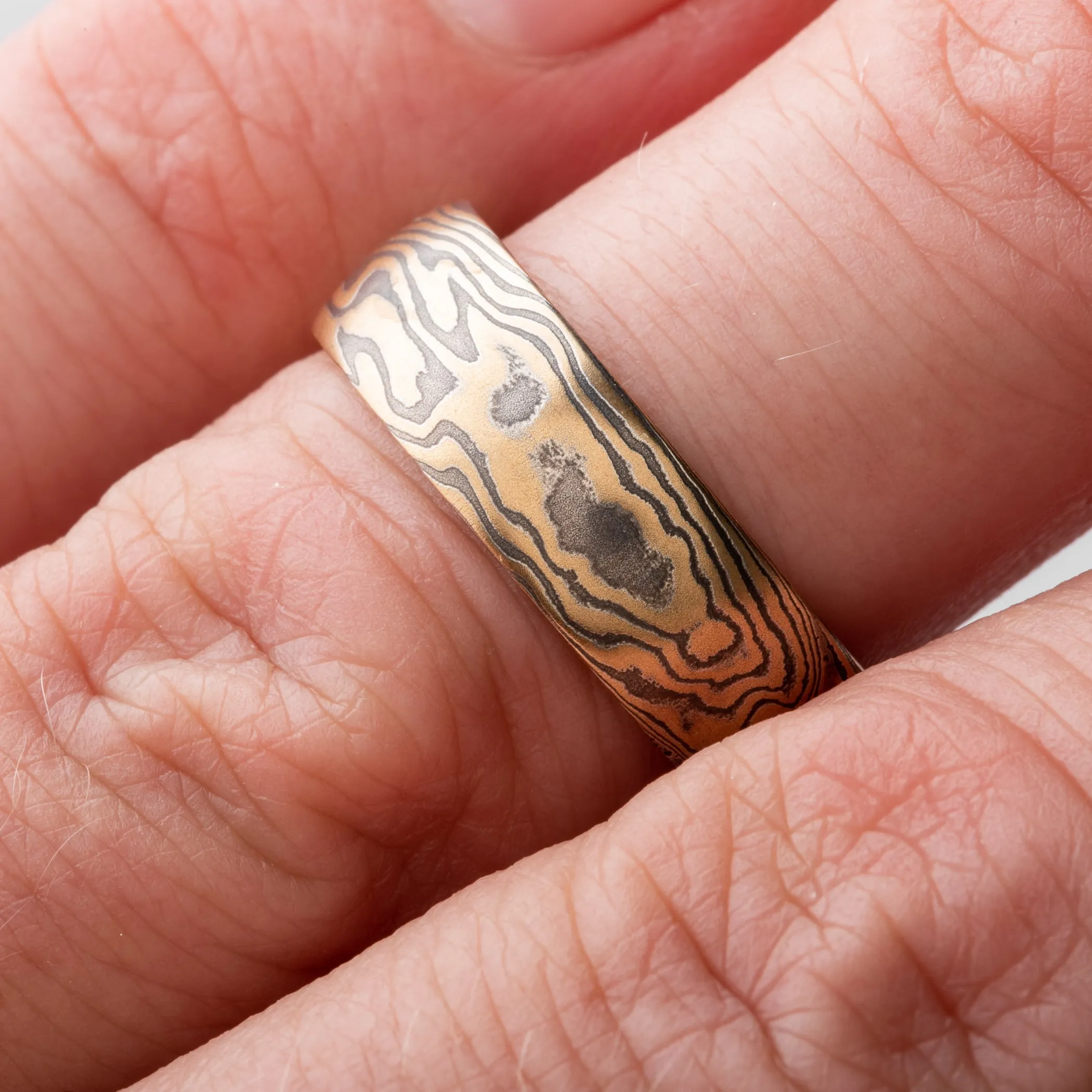 Bold and Earthy Mokume Gane Ring or Wedding Band in Twist Pattern and Oxidized Spark Palette