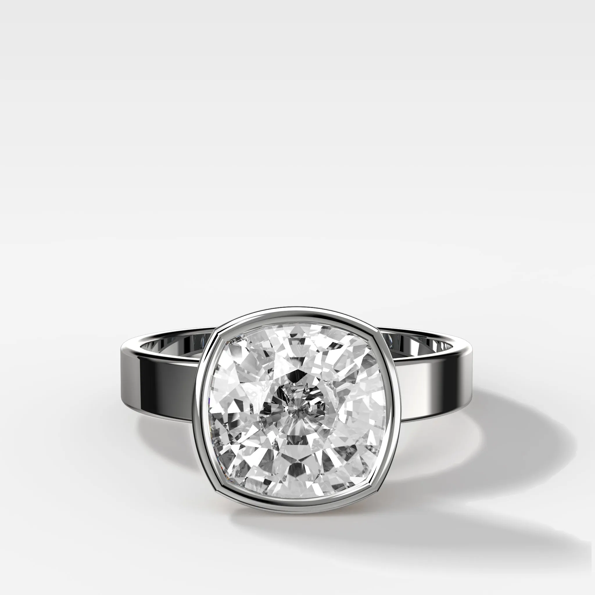 Finest Bezel Set Engagement Ring With Cushion Cut Diamond
