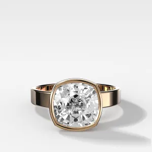 Finest Bezel Set Engagement Ring With Cushion Cut Diamond