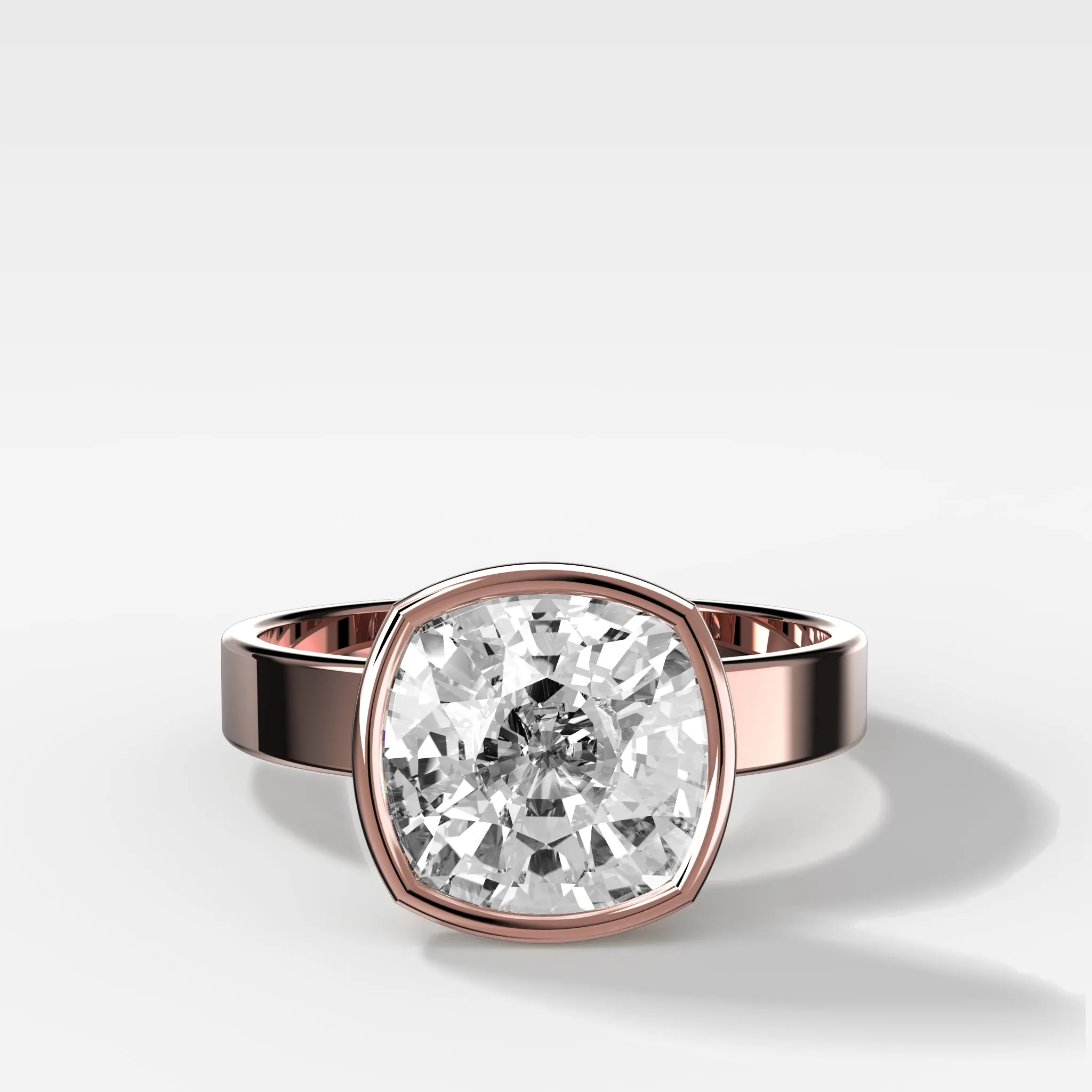 Finest Bezel Set Engagement Ring With Cushion Cut Diamond