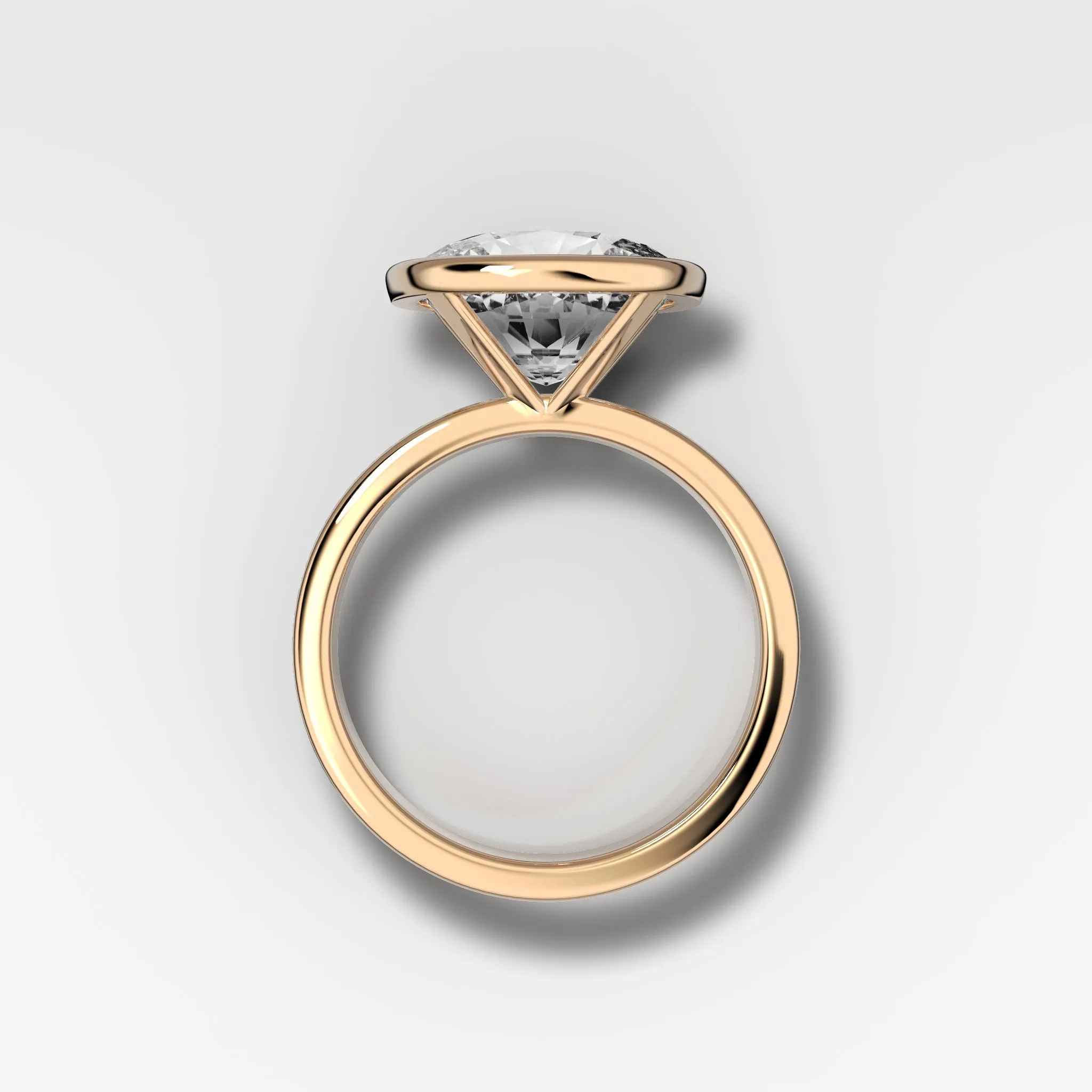 Finest Bezel Set Engagement Ring With East West Elongated Cushion Cut Diamond