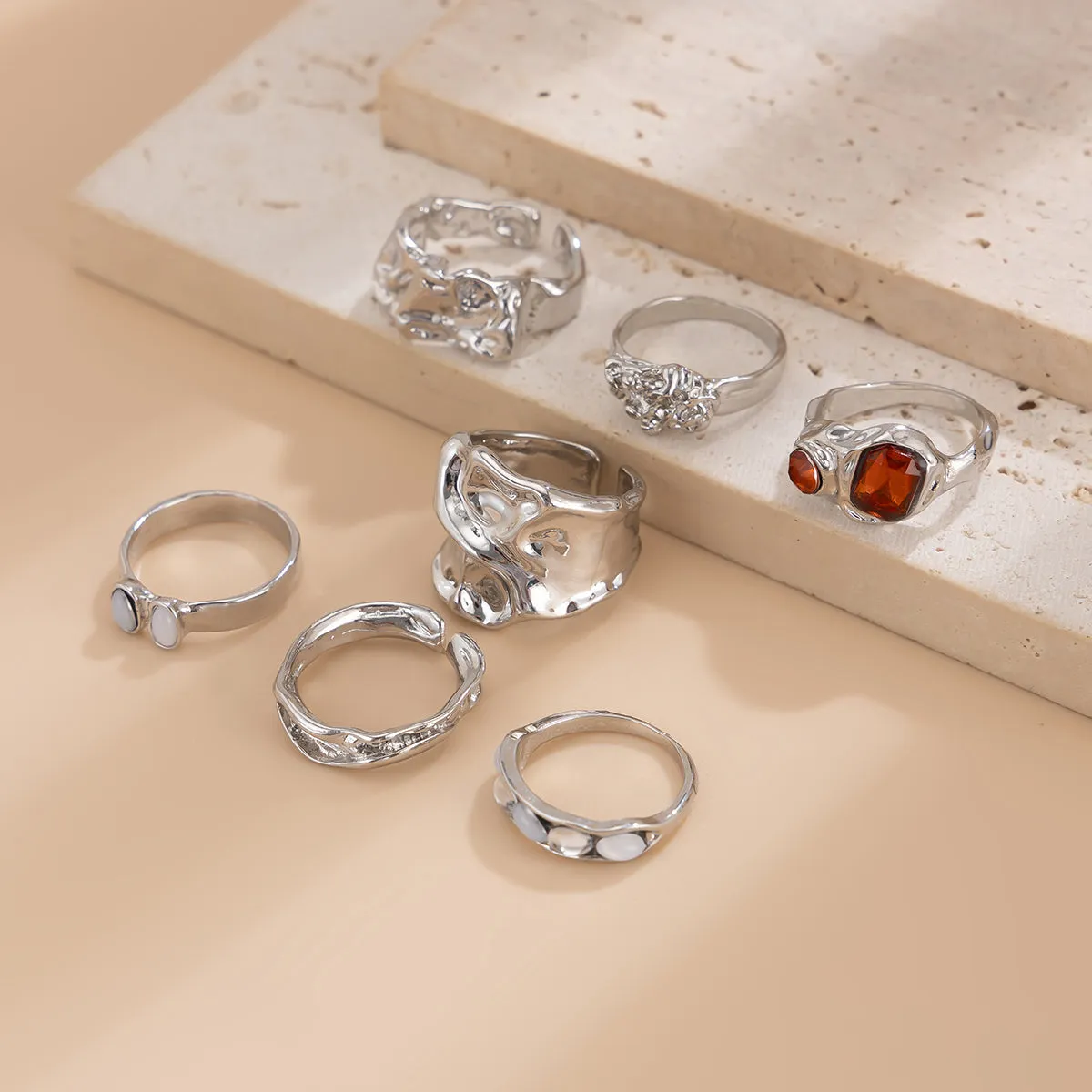 Gilded Drama: 7-Piece Statement Ring Set