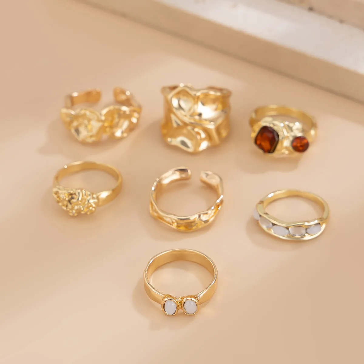 Gilded Drama: 7-Piece Statement Ring Set