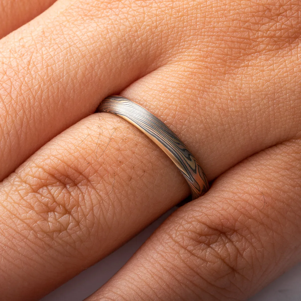 Hand Crafted Mokume Gane Wedding Band Set or Rings in Twist Pattern and Firestorm Palette