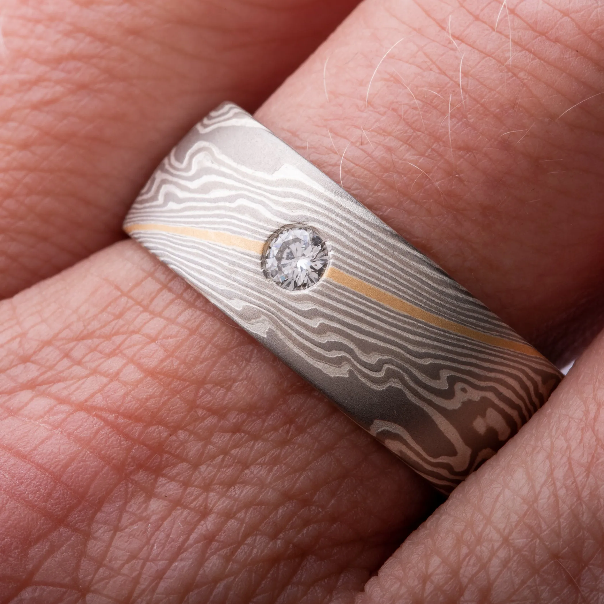 Luxurious Mokume Gane Wedding Ring Set in Custom Smoke Palette and Twist Pattern with 22k Gold Stratum