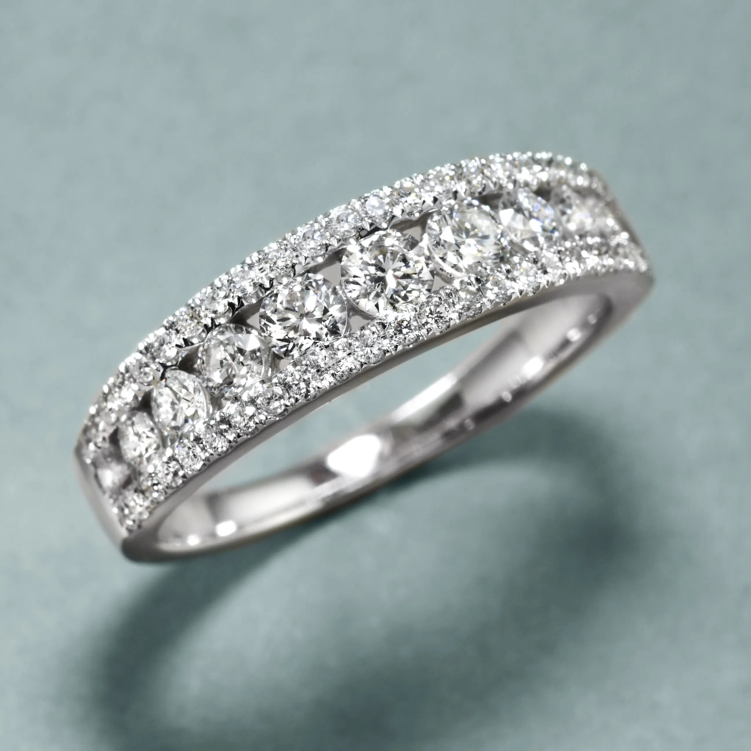 Mesmerizing Graduated Three-Row Diamond Band