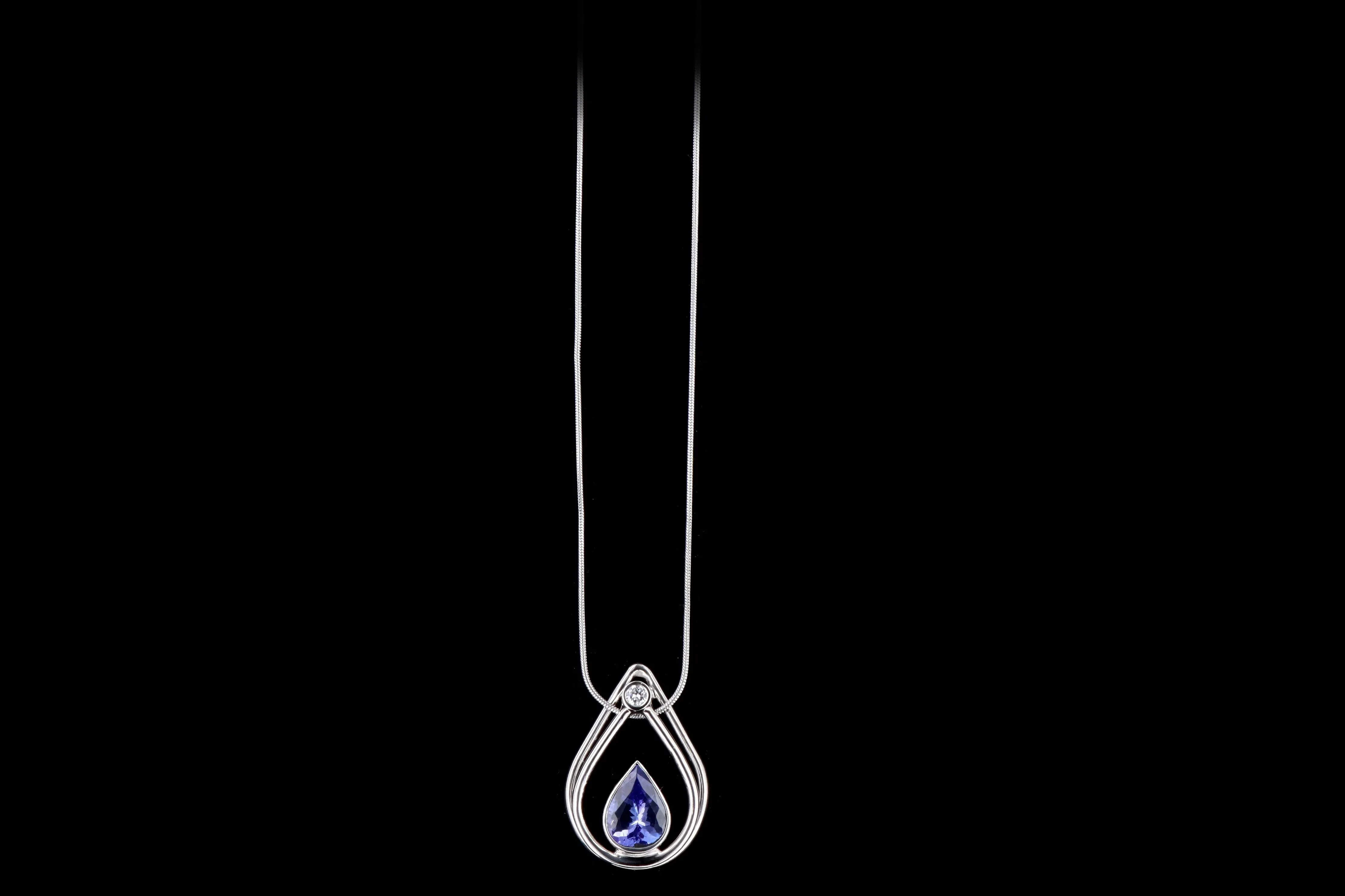 Modern Platinum 2.90 Carat Tanzanite & Diamond Pendant Necklace