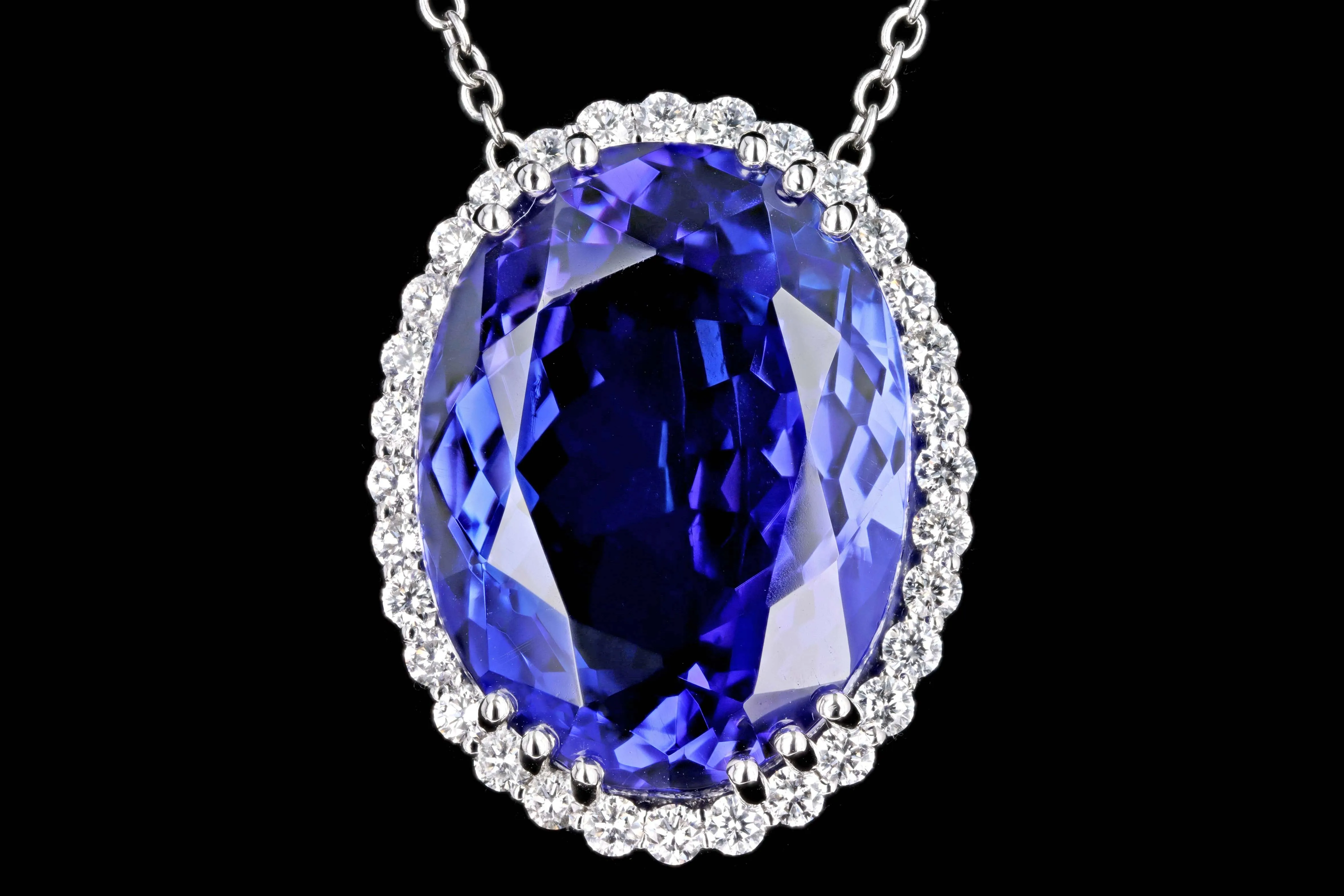 Platinum 28.65 Carat Oval Tanzanite & Diamond Halo Pendant Necklace