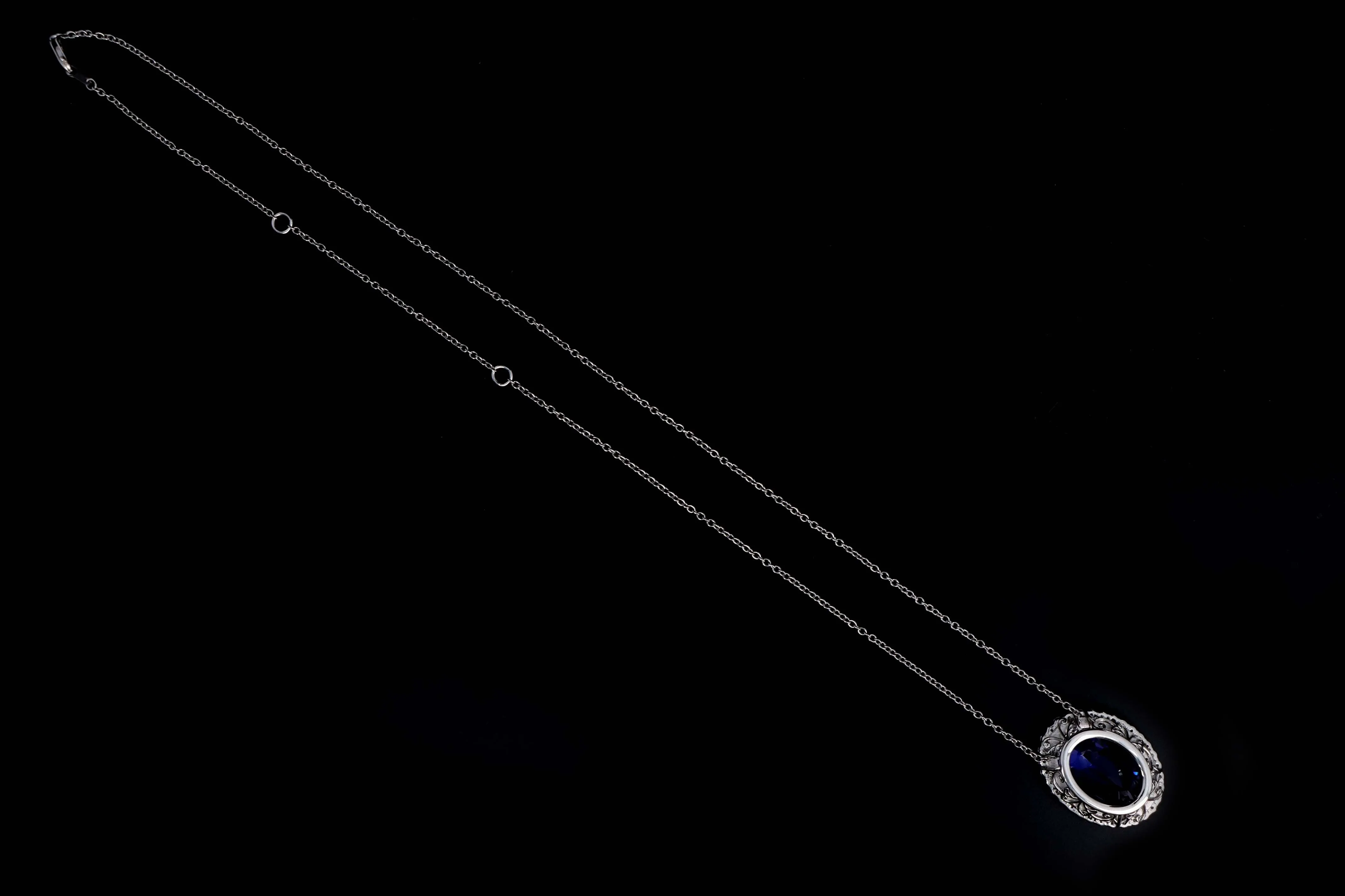 Platinum 28.65 Carat Oval Tanzanite & Diamond Halo Pendant Necklace