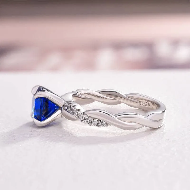 Round Cut Blue Simulated Diamond Twist Engagement Ring