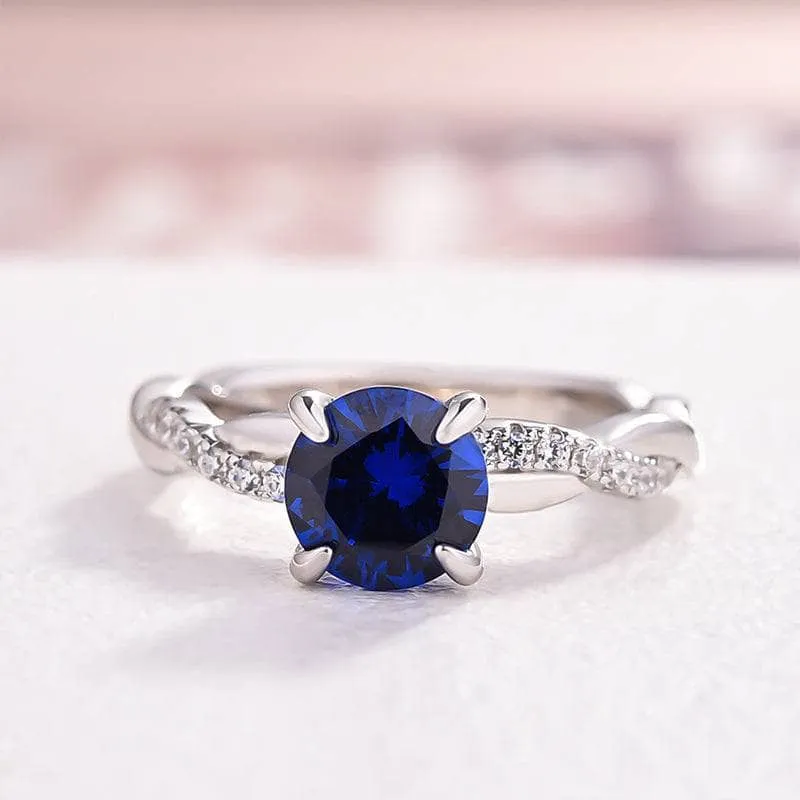Round Cut Blue Simulated Diamond Twist Engagement Ring