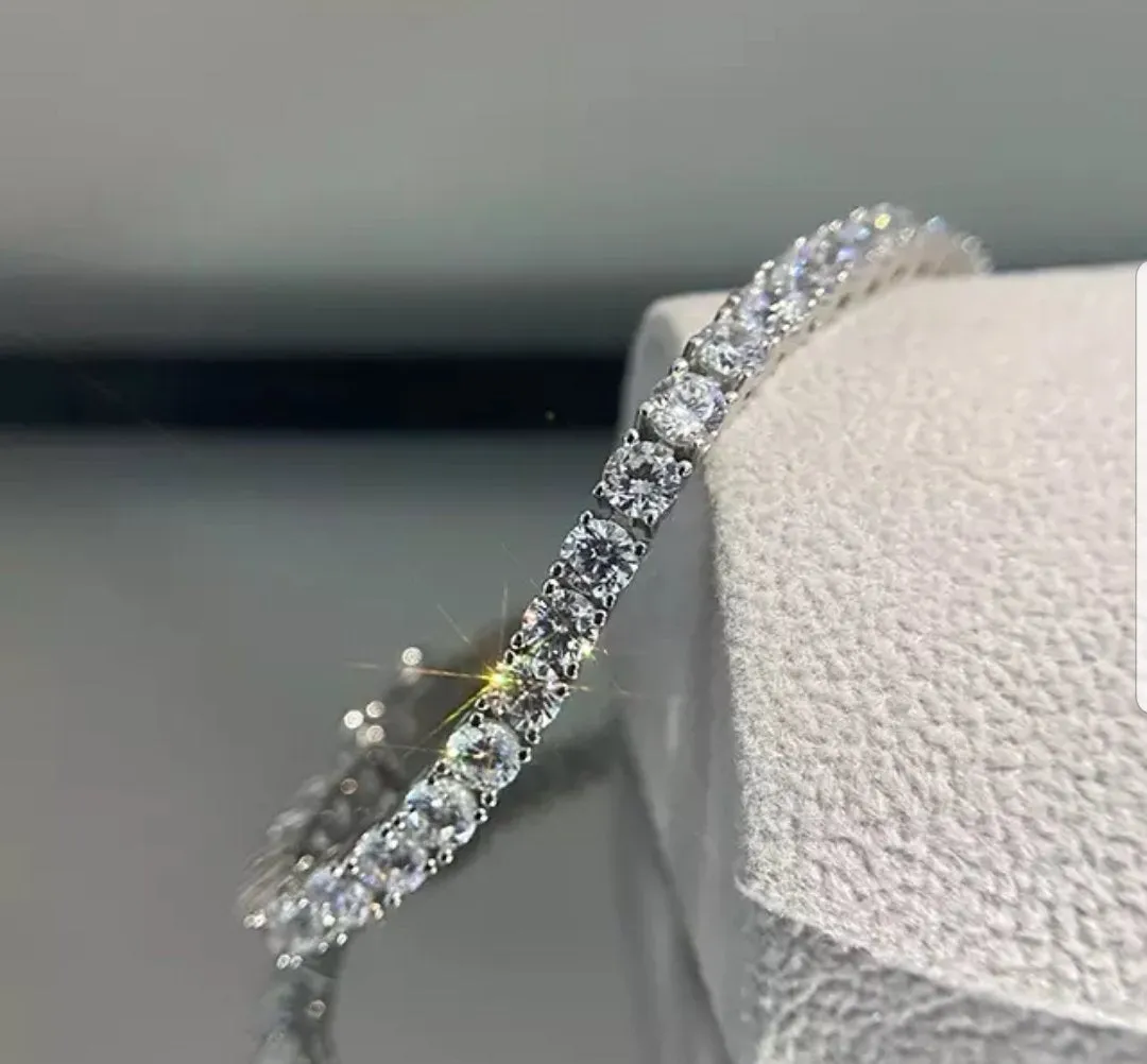 Round Diamond Veneer Cubic Zirconia Sterling Silver Tennis Bracelet. 635B1570