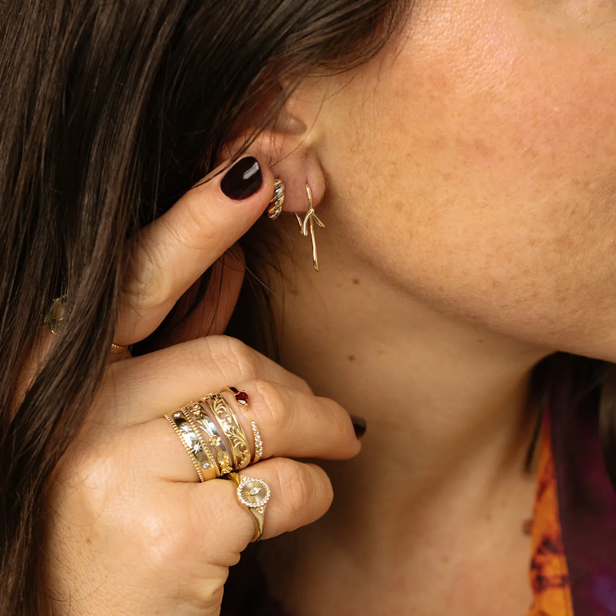 Solid Gold Mixed Metal Twisted Huggie Hoops
