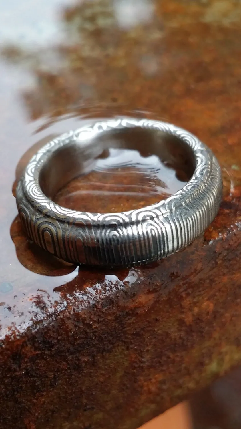 Stainles Damascus "traditional -twist"   Customizable ring!