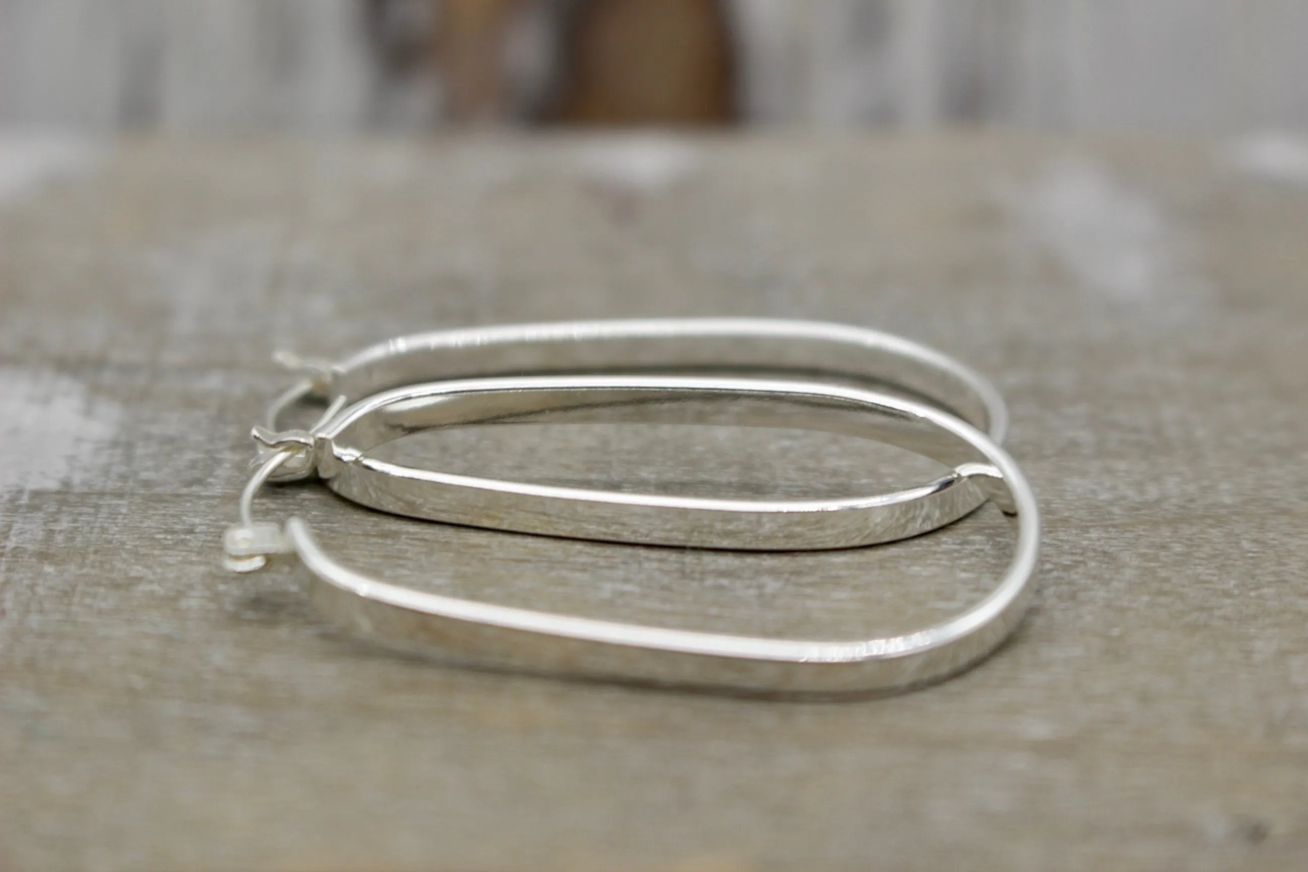 Sterling silver oval hoop earrings