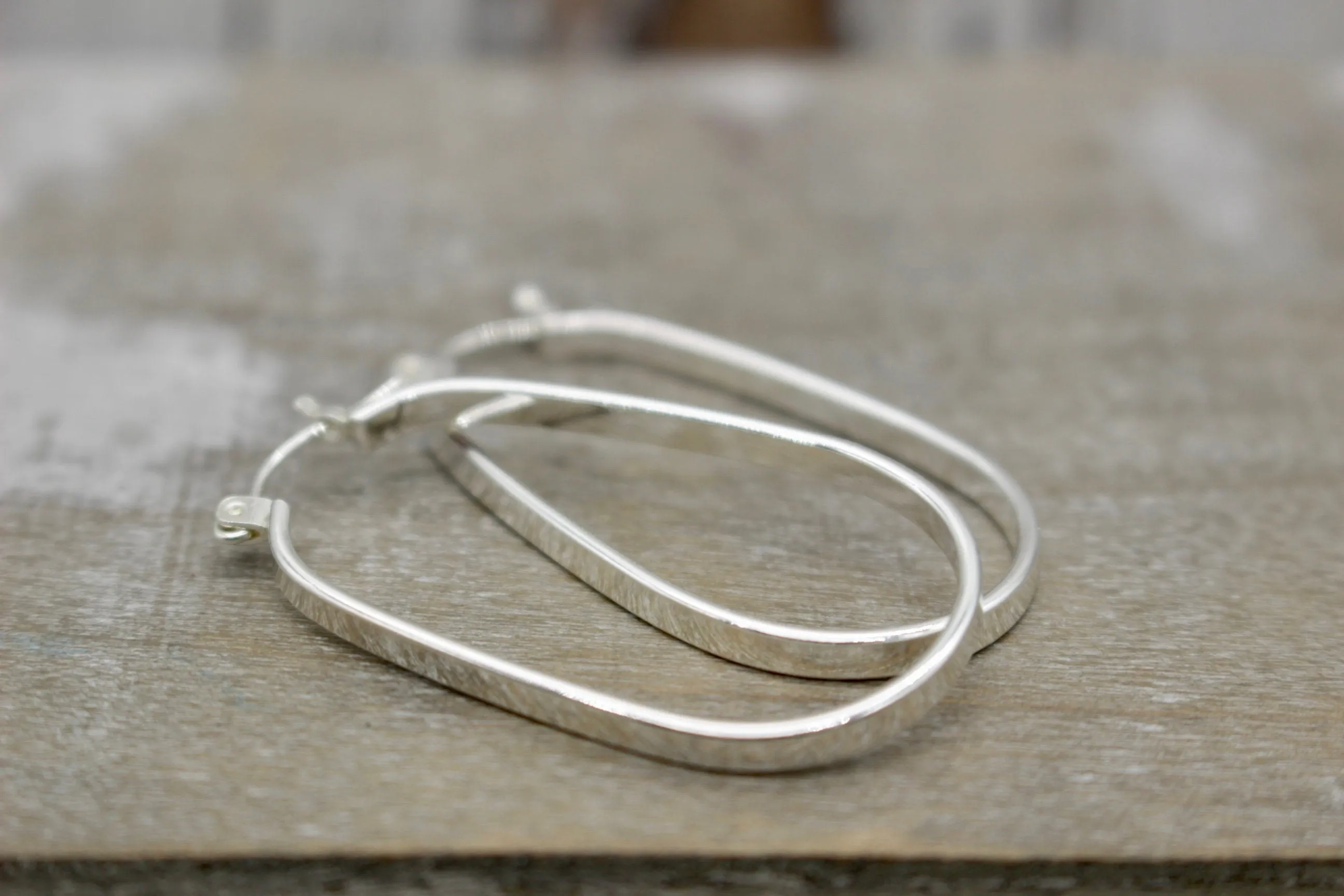 Sterling silver oval hoop earrings