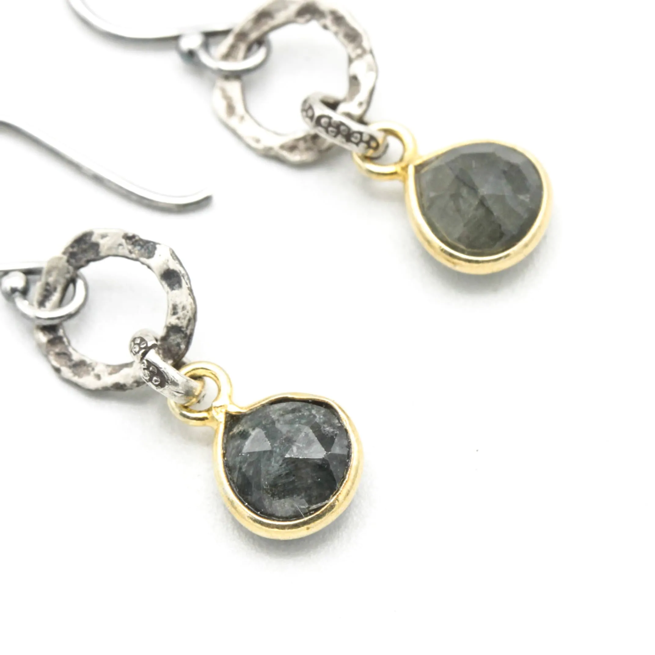 Teardrop faceted Emerald earrings in silver bezel setting with silver circle shape and hooks style on the top