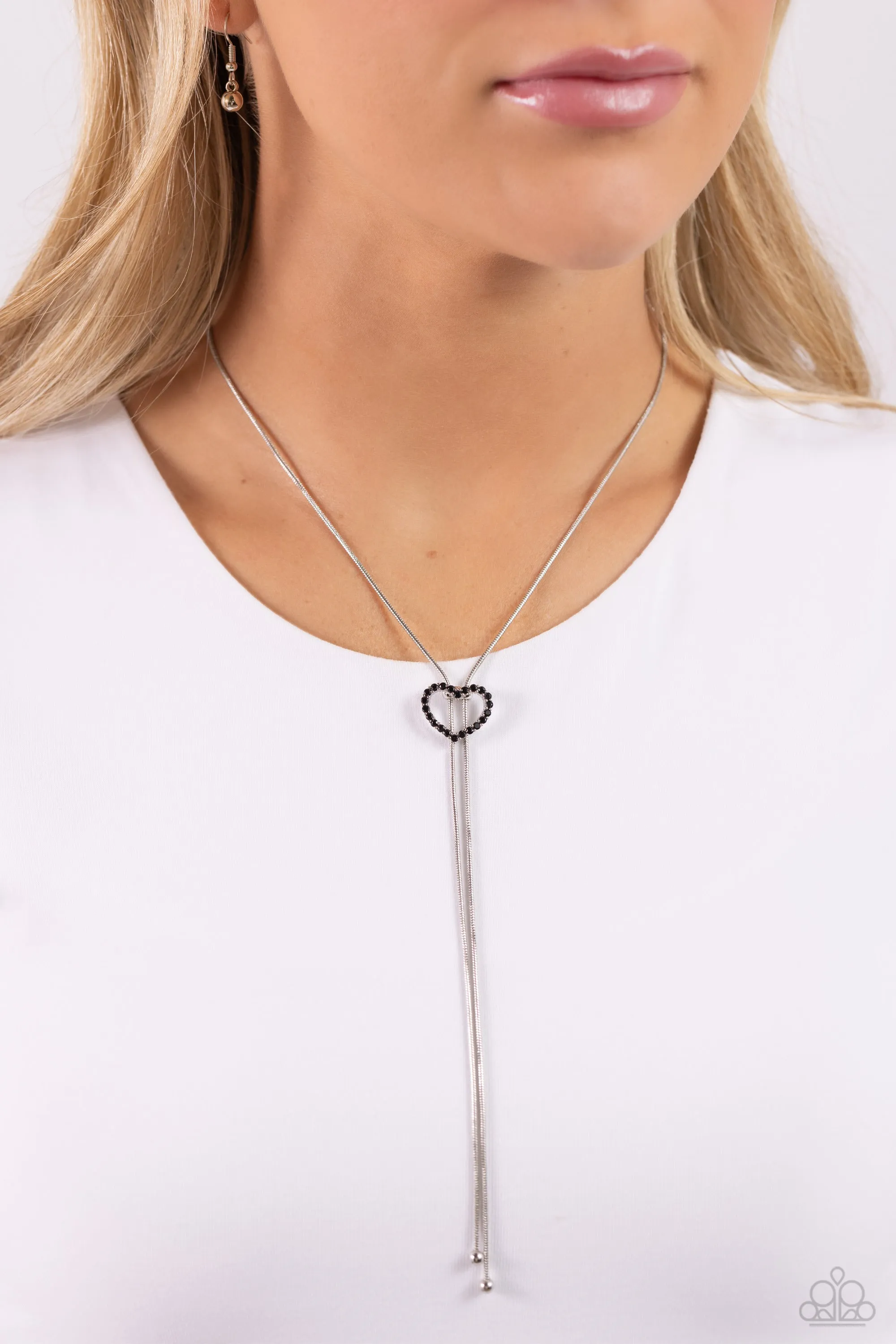 Tempting Tassel - Black - Rhinestone Encrusted Heart Paparazzi Bolo Necklace
