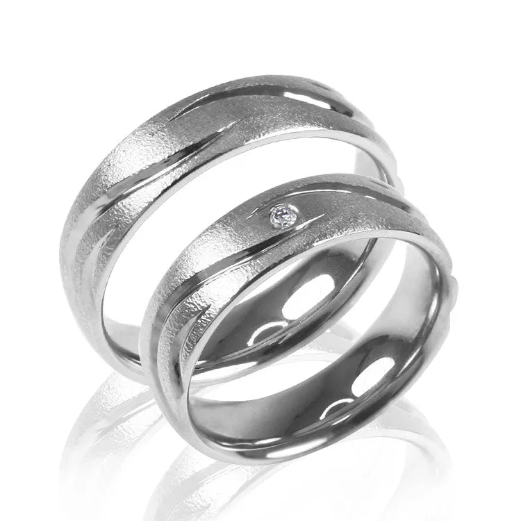TITAN RING SCULPTURED FINE HAMMERED