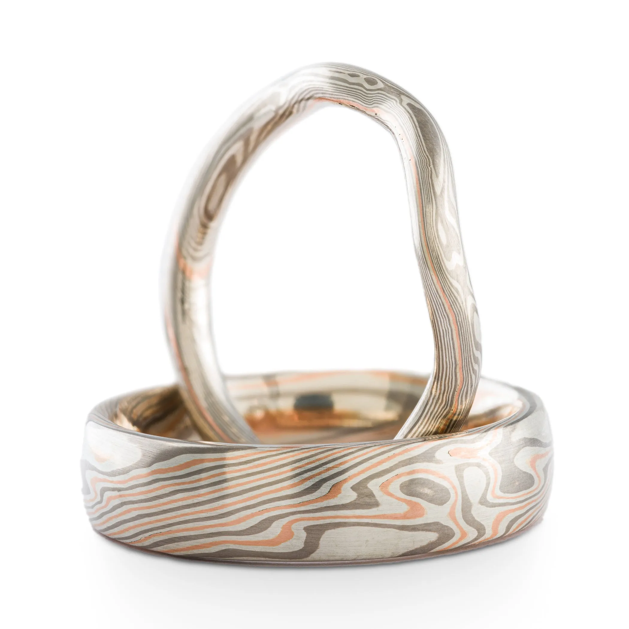Unique Mokume Gane Rings or Wedding Band Set with Contoured Band in Twist Pattern in Ash & Embers Palette with Red Gold Stratum