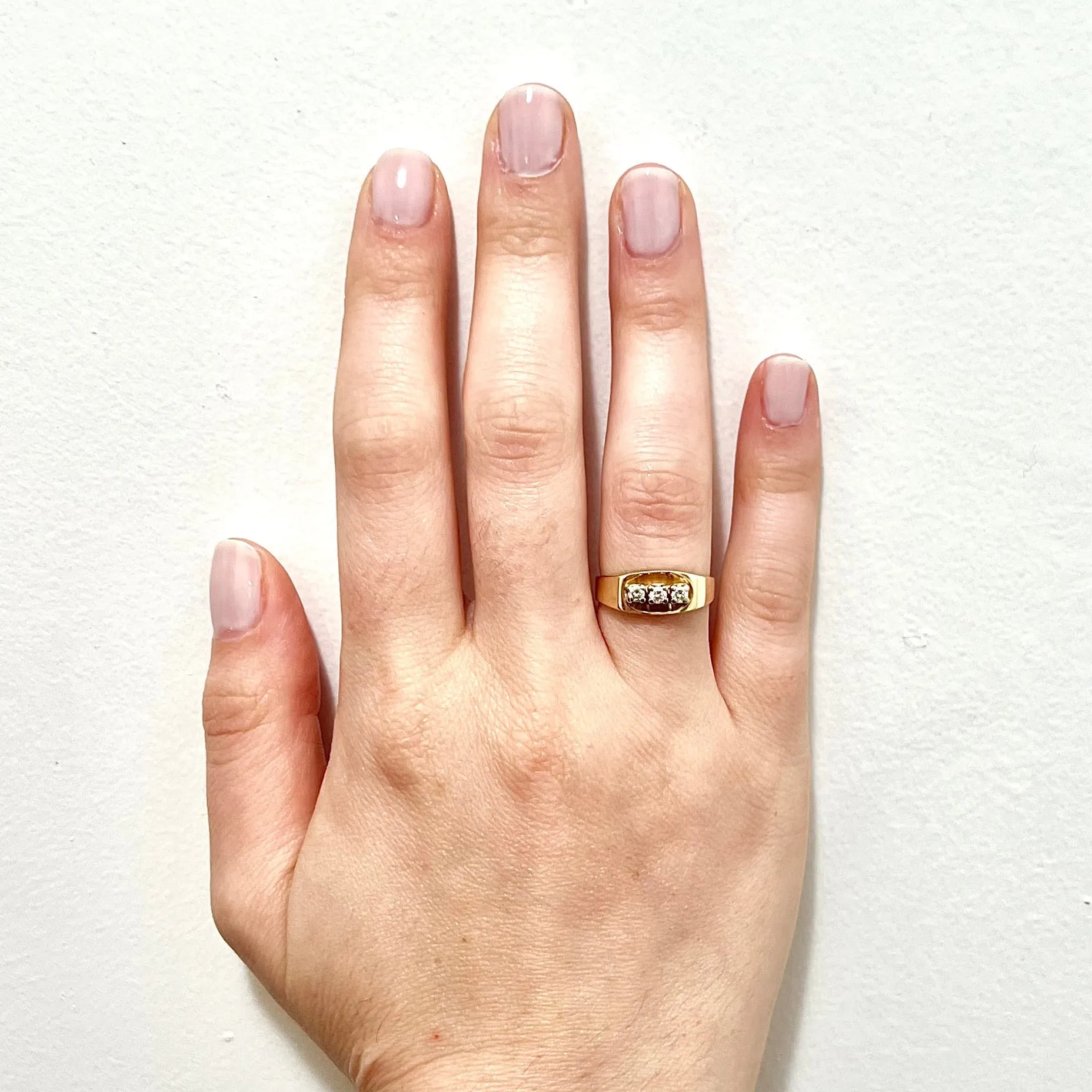 Vintage 14 Karat Yellow Gold Three-Stone 0.20 Carat Diamond Ring